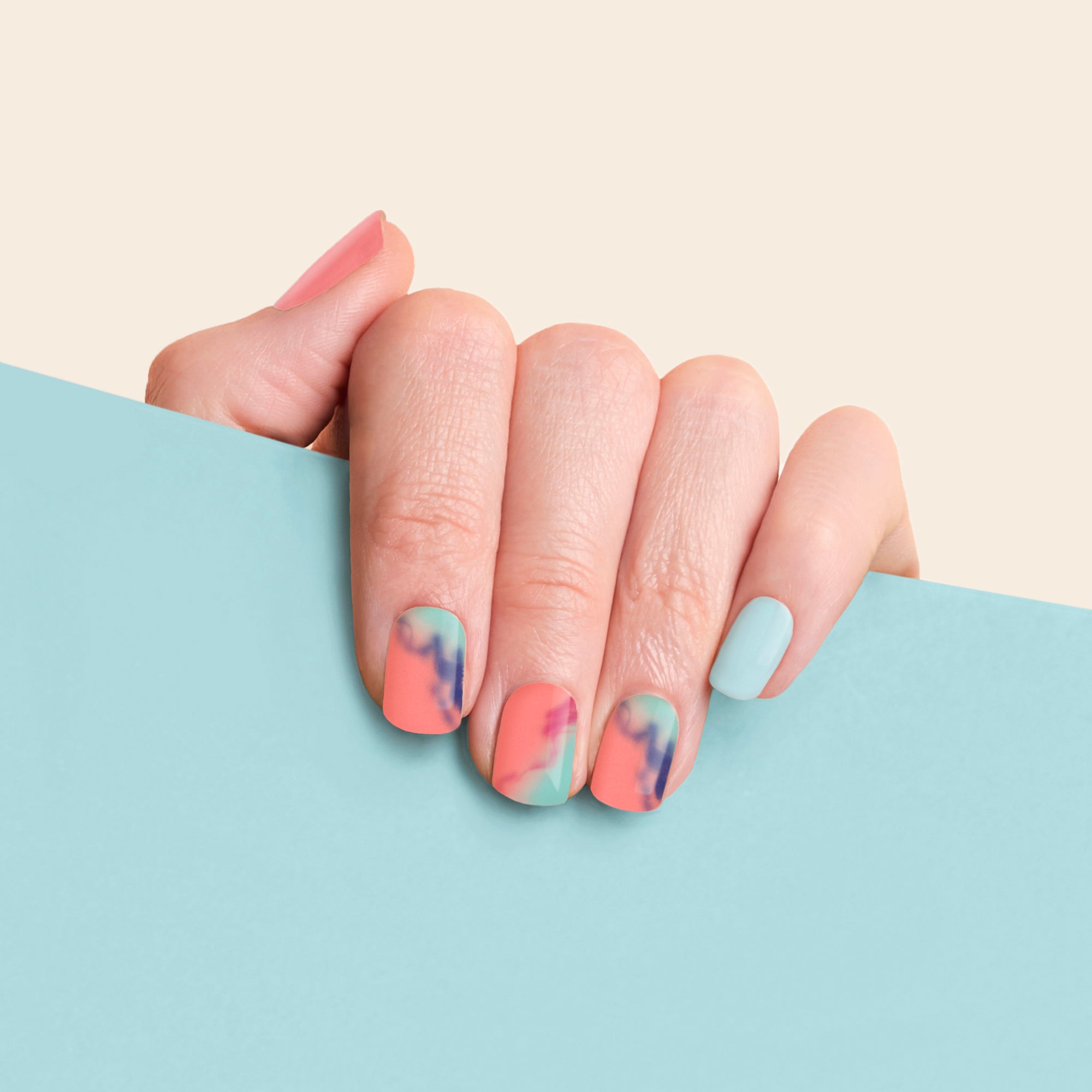 mesme Jodie Pink Blue 3+ Day UV-Free Gel Nail Wraps On Hand