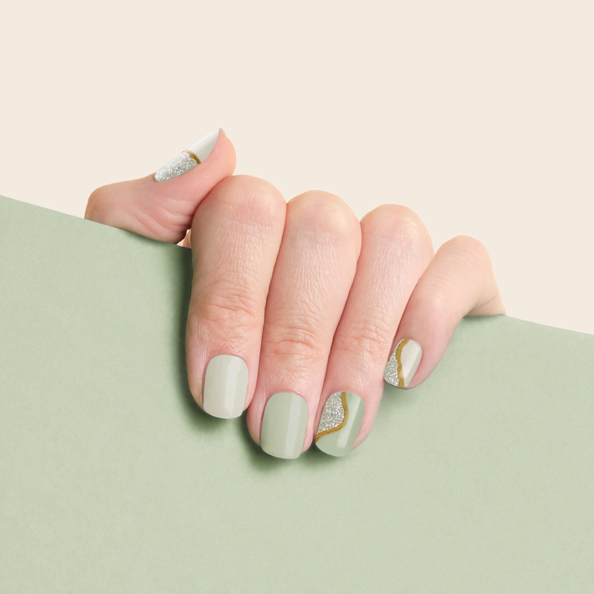 mesme Kim Sage Green 3+ Day UV-Free Gel Nail Wraps On Hand