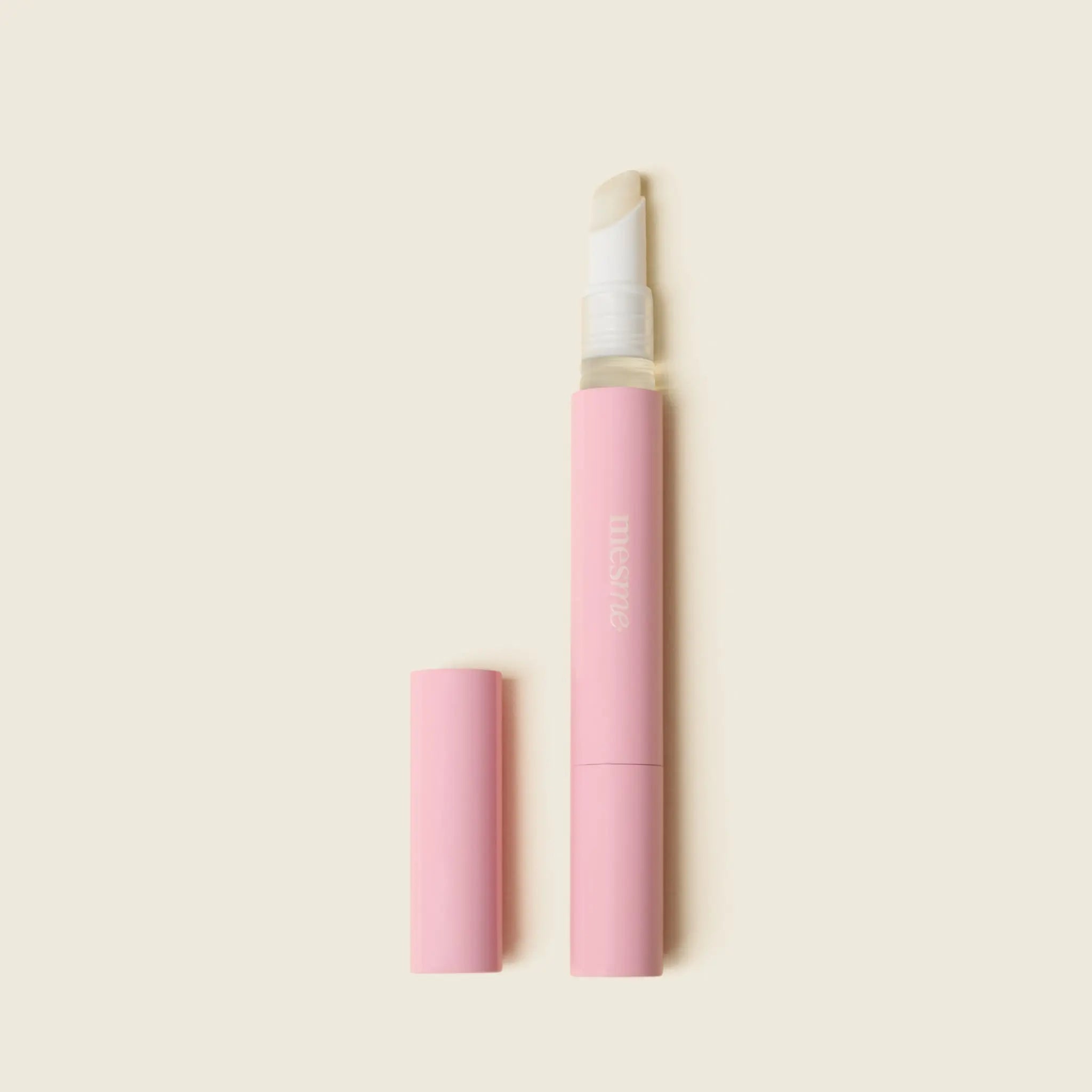 mesme Remover Pen — for all wraps — sliding the pen tip under the wrap to lift gently (in use)