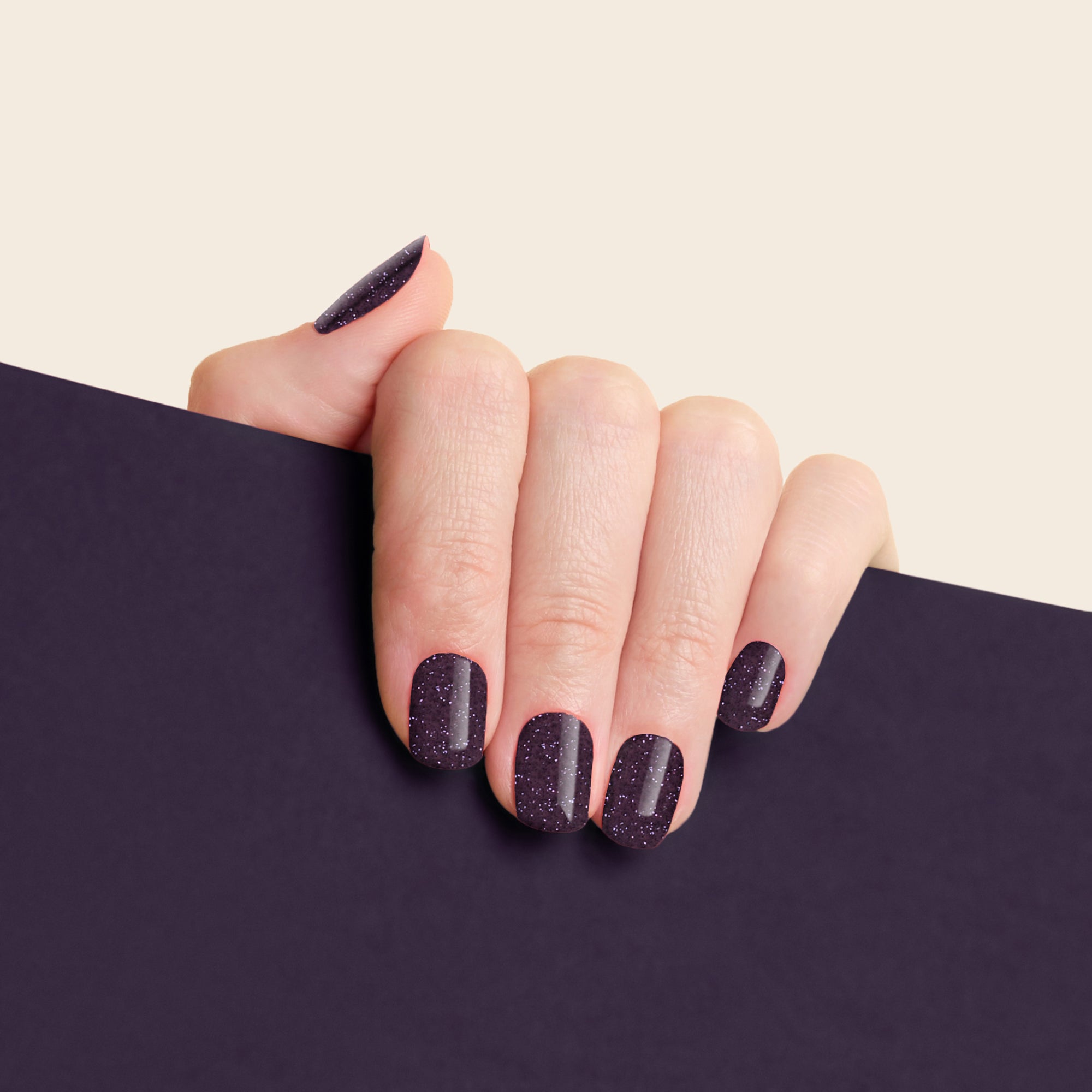 mesme Stephanie Dark Plum Glitter 10-Day UV-Free Nail Wraps On Hand