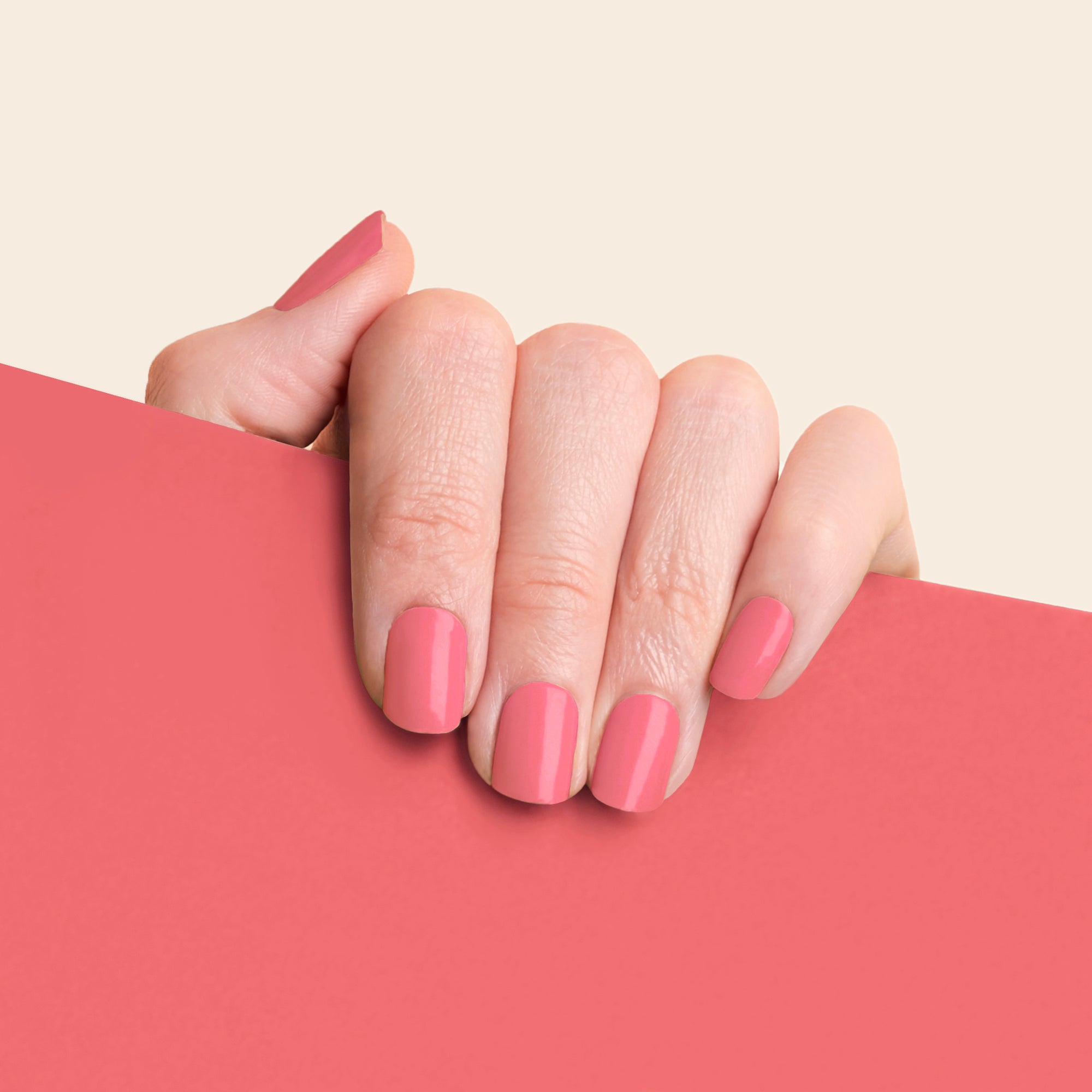 mesme Sylvia Coral Pink 14-Day UV Gel Nail Wraps On Hand